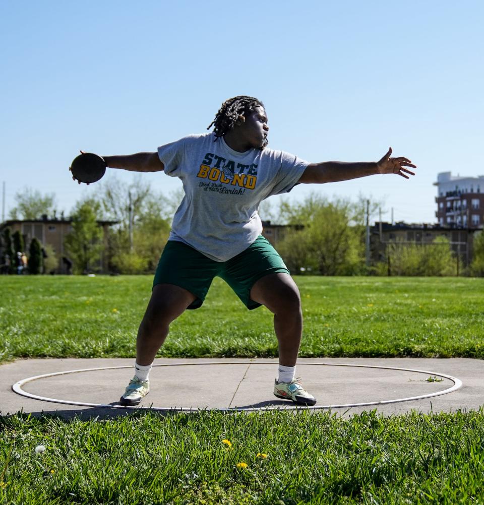 Crispus Attucks' Lariah Wooden practices throwing the discus on Tuesday, April 18, 2023.