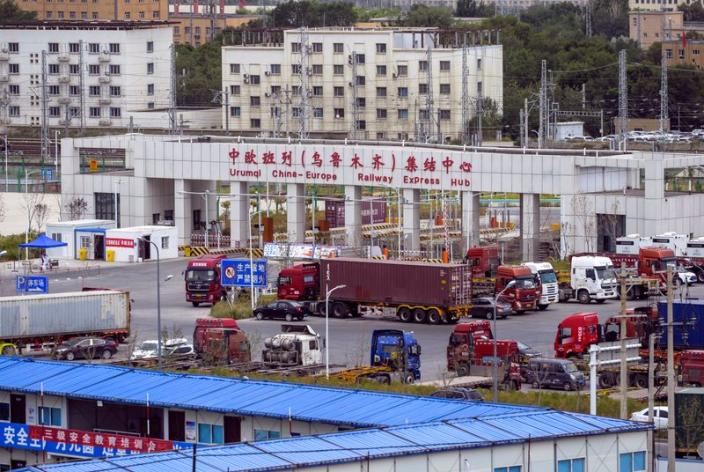 Container trucks are seen at the Urumqi China-Europe Railway Express Hub in Urumqi