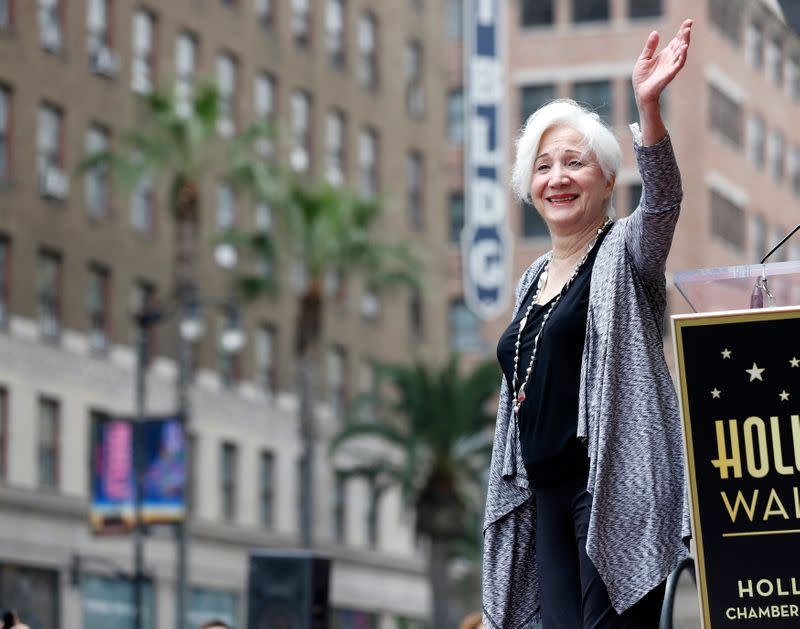 Dukakis waves at the ceremony for the unveiling of her star on the Walk of Fame in Los Angeles