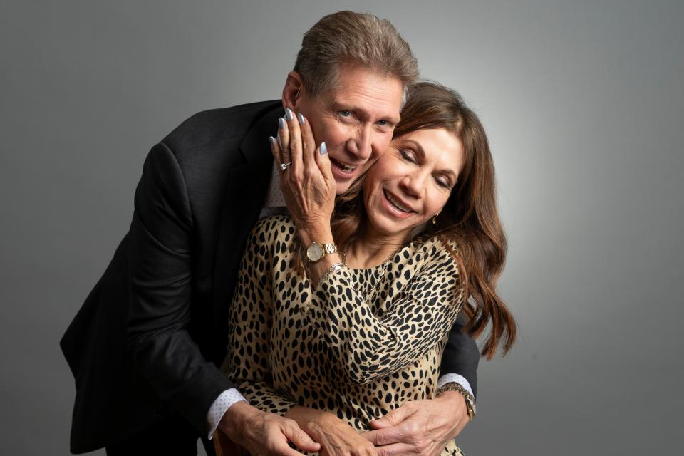 Gerry Turner poses with Theresa Nist, showing off her Neil Lane engagement ring, for a portrait the day after the season finale of the series.