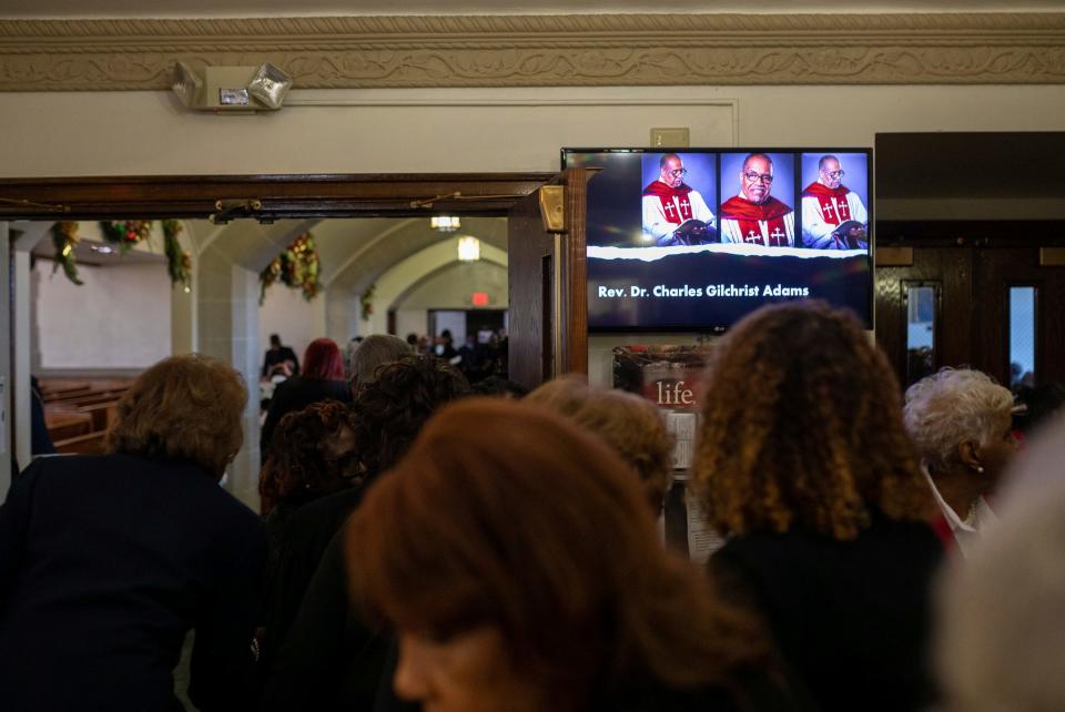 People begin to take their seats inside the Hartford Memorial Baptist Church in Detroit during the funeral ceremony of the Rev. Charles G. Adams, a retired pastor, on Friday, Dec. 15, 2023.