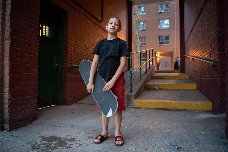 Landon Rodriguez outside the apartment building where he lives.