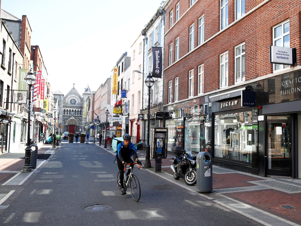 FILE PHOTO: A Deliveroo worker is seen in Dublin City Centre, following the outbreak of the coronavirus disease (COVID-19), Dublin, Ireland, May 1, 2020. REUTERS/Jason Cairnduff/File Photo