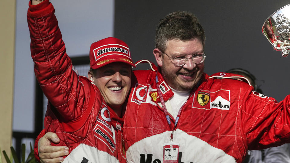 Michael Schumacher and Ross Brawn, pictured here at the Brazilian Grand Prix in 2002.