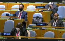 In this image made from UNTV, representatives of different countries listen to speakers during the 75th session of the United Nations General Assembly, Tuesday, Sept. 22, 2020, at U.N. headquarters in New York. This year's annual gathering of world leaders at U.N. headquarters is almost entirely "virtual." Leaders have been asked to pre-record their speeches, which are being shown in the General Assembly chamber, where each of the 193 U.N. member nations are allowed to have one diplomat present. (UNTV via AP )