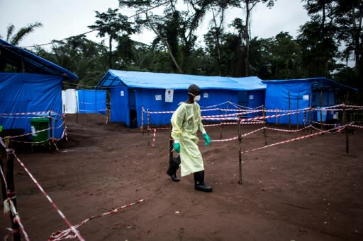 This file photo taken last year in DR Congo shows healthcare workers at an Ebola quarantine unit in Muma, after a case of Ebola was confirmed in the village. A fresh outbreak of the disease in Bikoro since April has so far claimed 18 lives