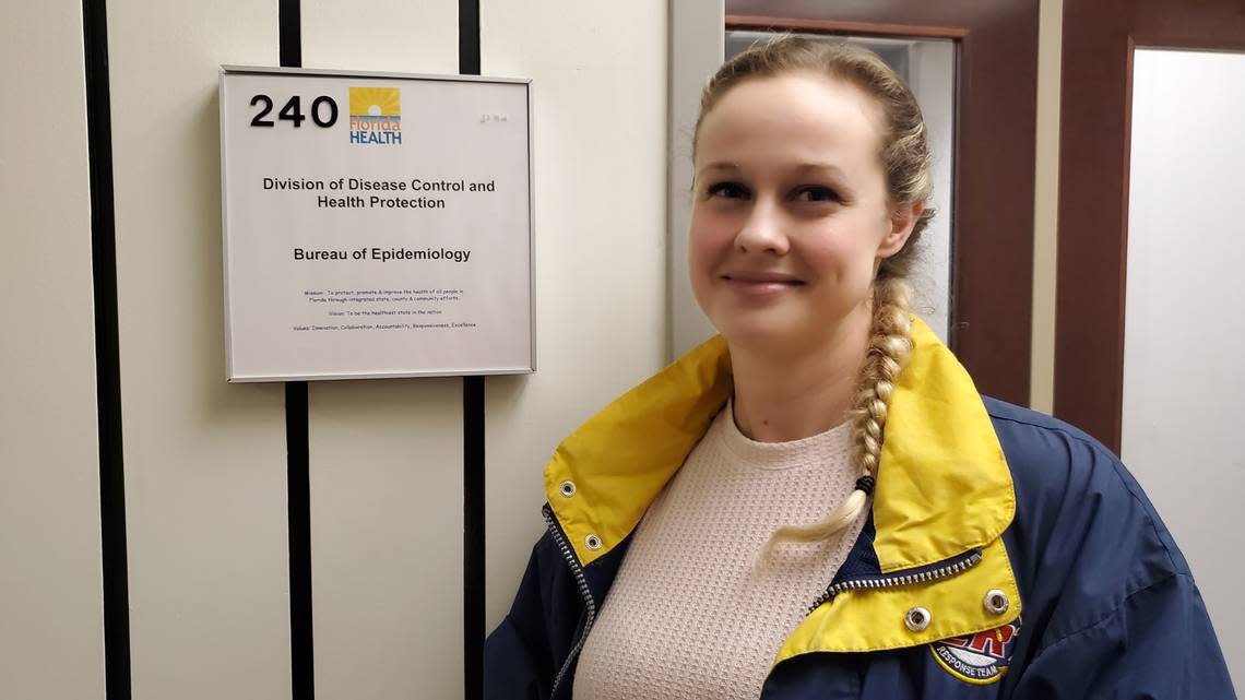 Rebekah Jones stands outside her office at the Florida Department of Health, where she maintained the COVID-19 data dashboard until her dismissal.