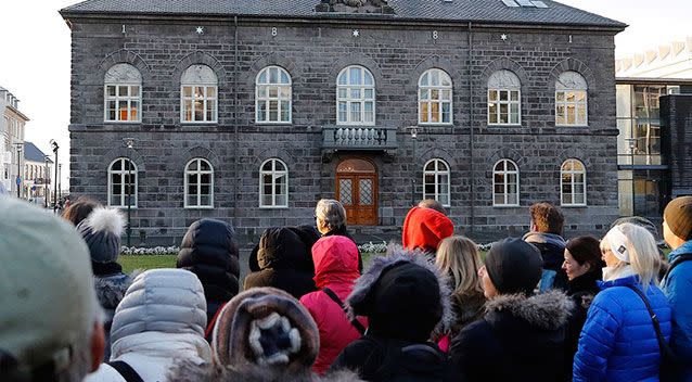 Supporters outside the Icelandic Parliament on March 8, 2017, the day the equal pay bill was passed. Source: AAP