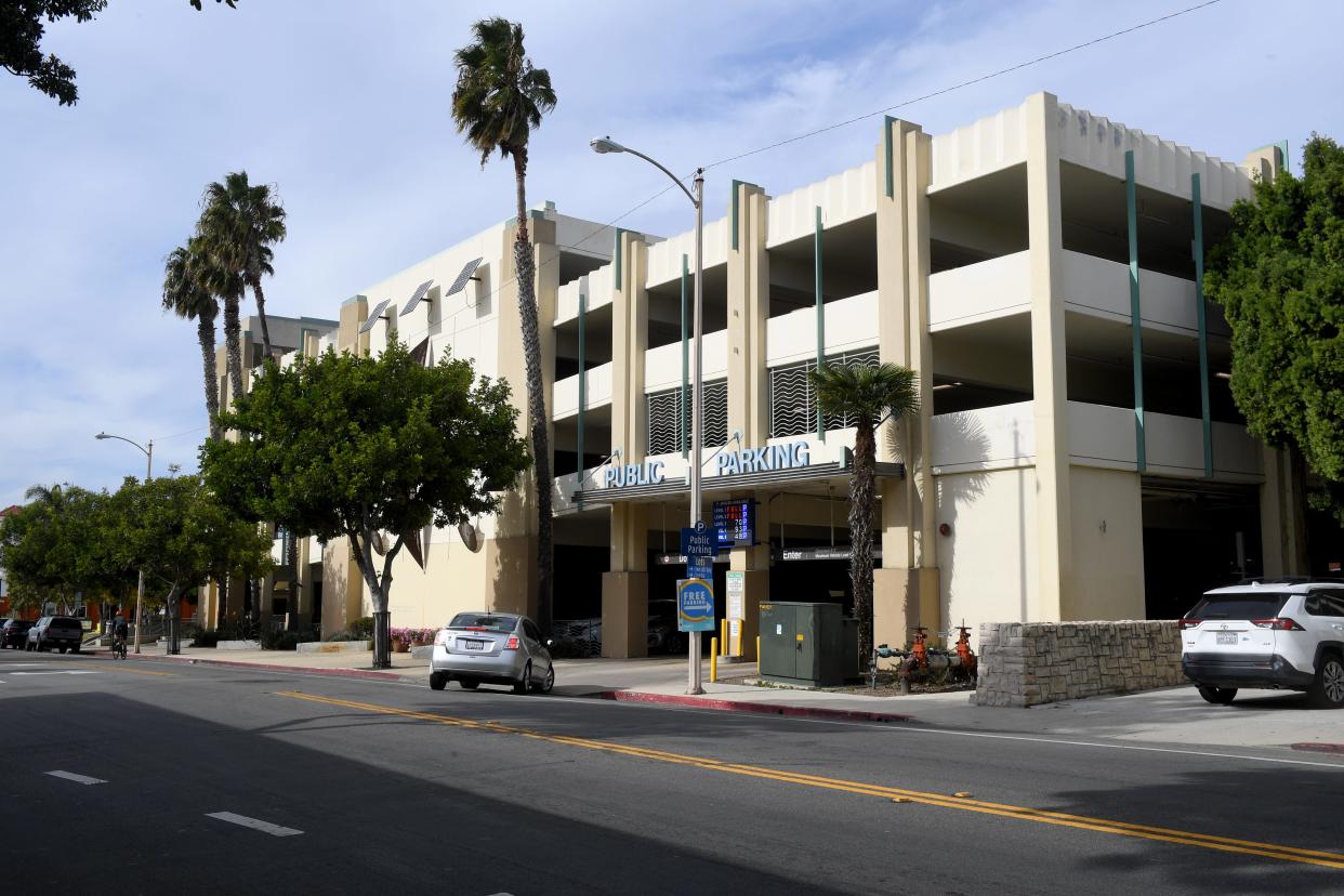 A driver turns into the downtown Ventura parking garage on East Santa Clara Street in November. The Ventura City Council on Tuesday changed its mind on charging for downtown parking, originally set for May.