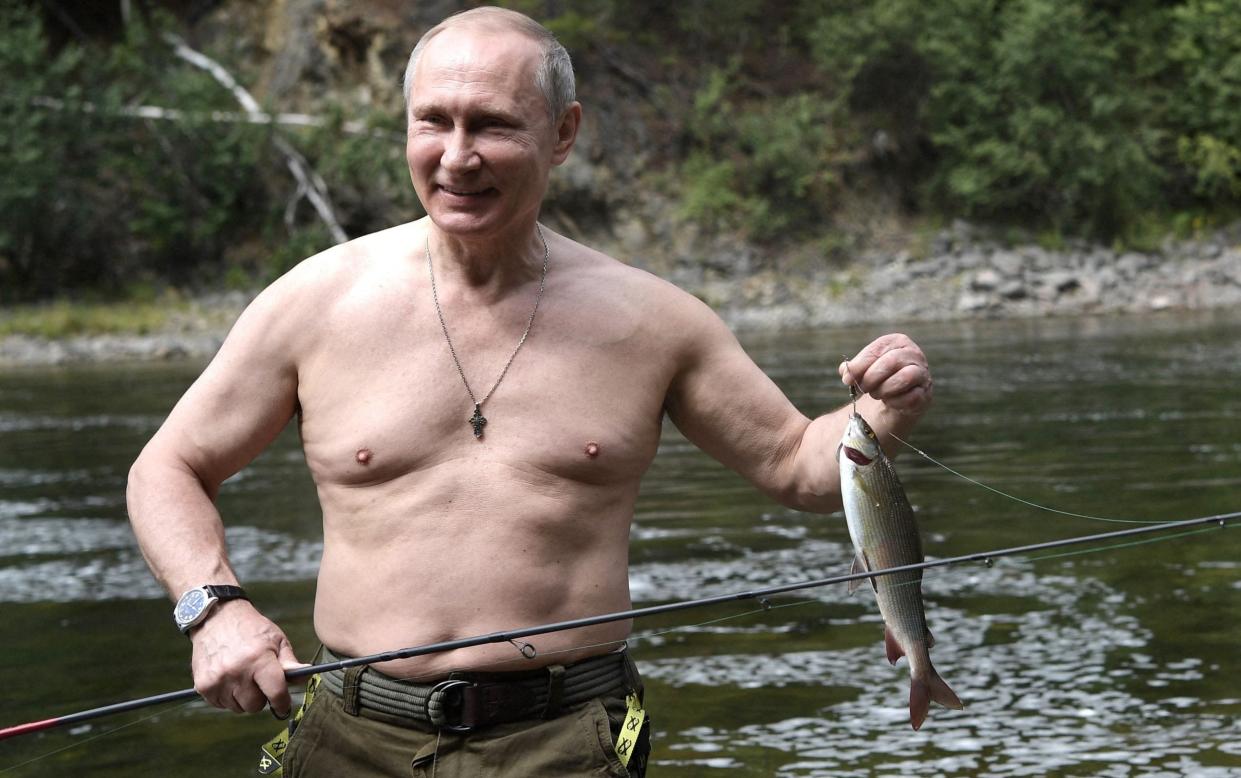 Vladimir Putin fishing - ALEXEY NIKOLSKY/AFP