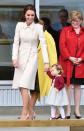 <p>The royal family's tour of Canada saw Kate appear in some memorable looks. This elegant nude coat – complete with a feminine collar and emblematic maple leaf brooch – was the perfect outfit to bid farewell to the country. <i>[Photo: PA]</i> </p>