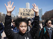 <p>A student holds up her hands while taking part in National School Walkout Day to protest school violence on April 20, 2018 in Chicago, Illinois. (Photo: Jim Young/Getty Images) </p>