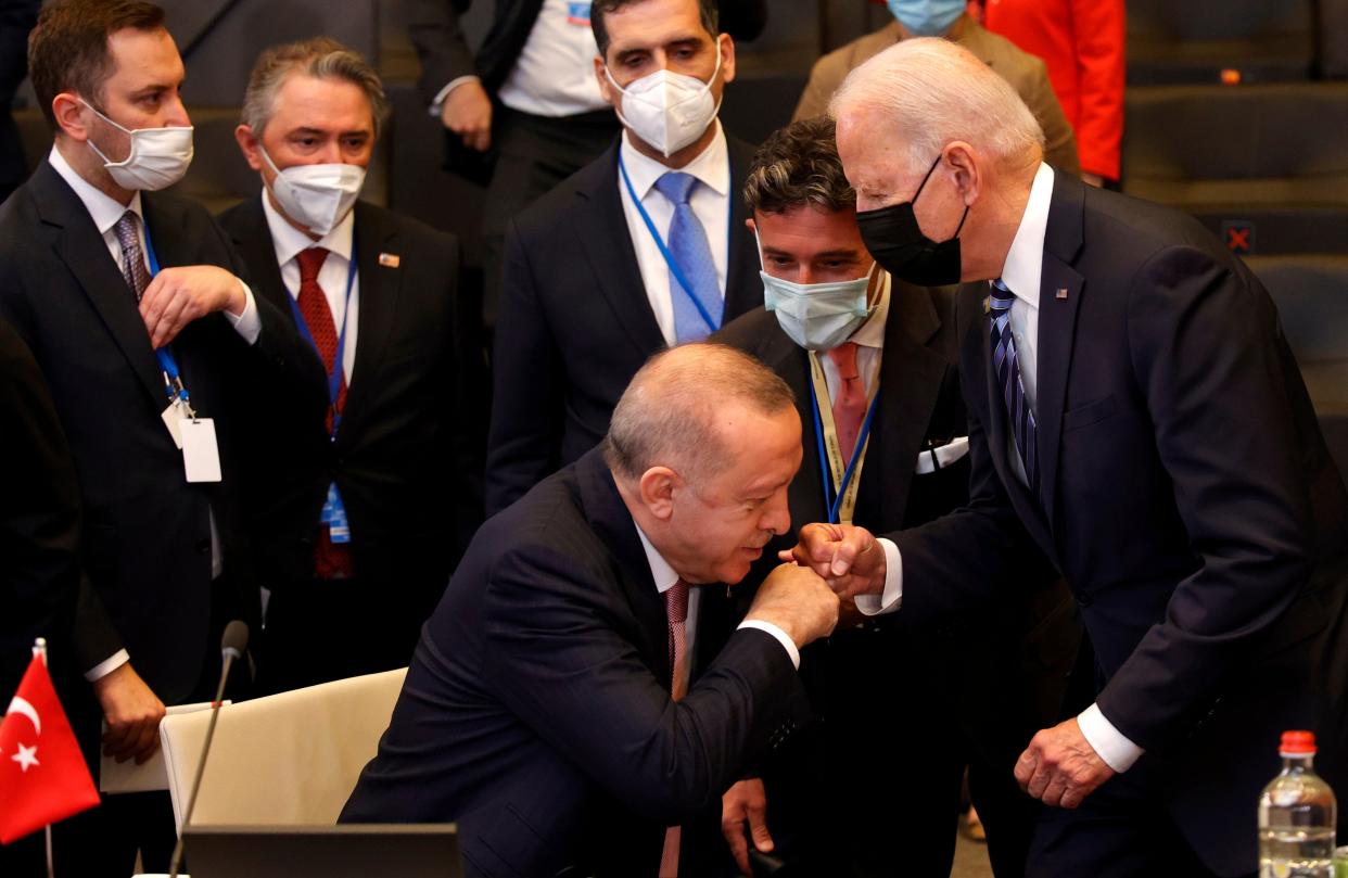 Turkey’s Recep Tayyip Erdoğan greets US President Joe Biden at the 2021 NATO summit. (AP)