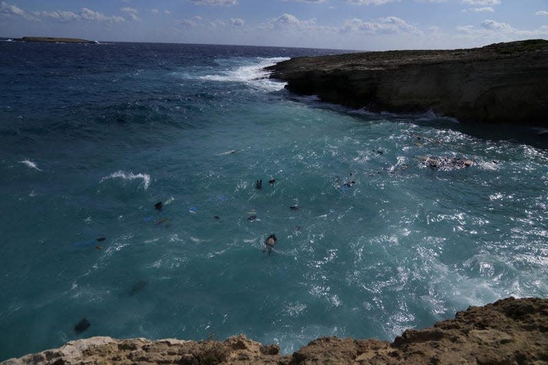 Photo:  Thanassis Stavrakis (AP)