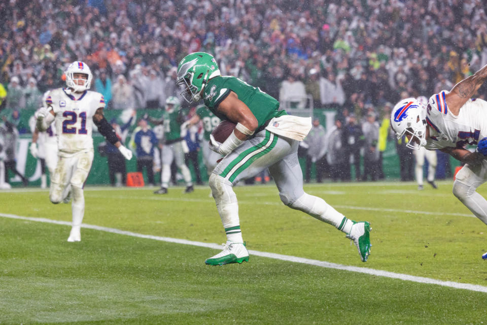 Nov 26, 2023; Philadelphia, Pennsylvania, USA; Philadelphia Eagles quarterback Jalen Hurts (1) scores the game winning touchdown against the Buffalo Bills in overtime at Lincoln Financial Field. Mandatory Credit: Bill Streicher-USA TODAY Sports