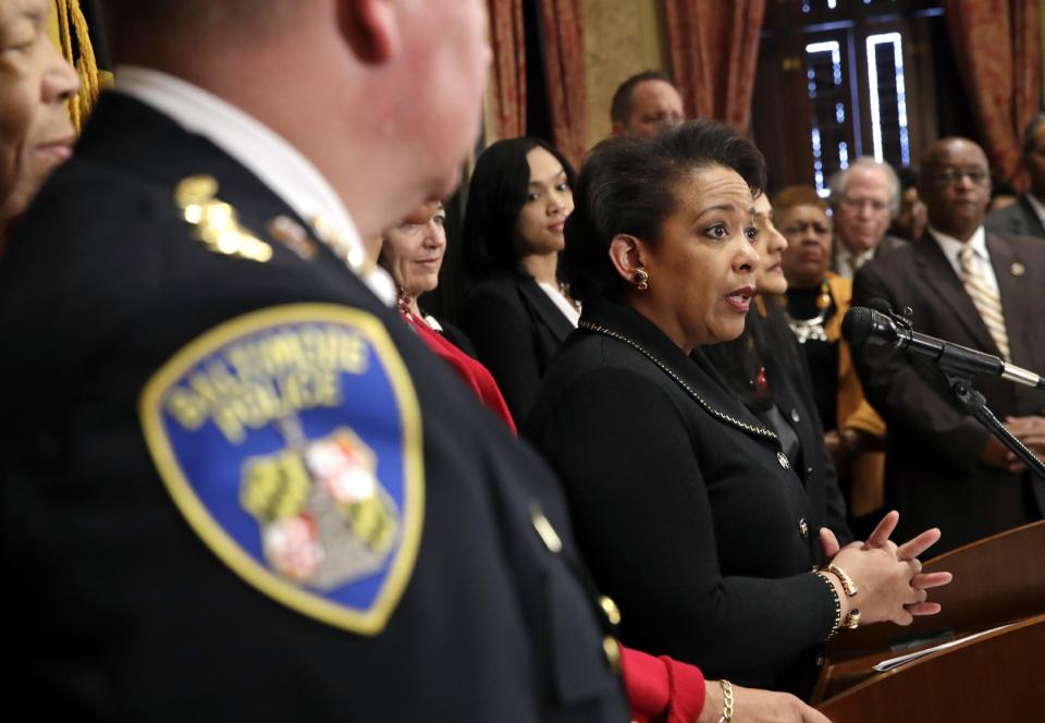 Attorney General Loretta Lynch speaks at a news conference in Baltimore, Thursday, Jan. 12, 2017, to announce the Baltimore Police Department's commitment to a sweeping overhaul of its practices under a court-enforceable agreement with the federal government. (AP Photo/Patrick Semansky)