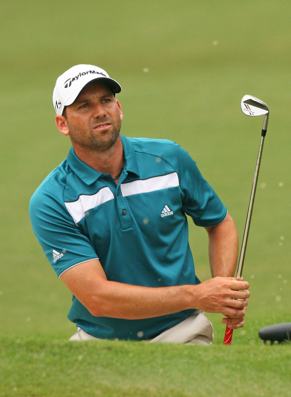 GREENSBORO, NC - AUGUST 20: Sergio Garcia of Spain hits his third shot on the 15th hole during the final round of the Wyndham Championship at Sedgefield Country Club on August 20, 2012 in Greensboro, North Carolina. (Photo by Hunter Martin/Getty Images)