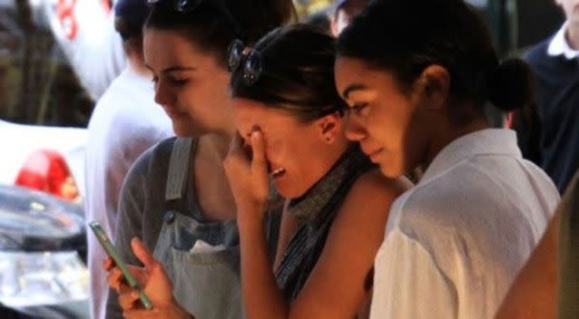 Friends of Cole Miller grieve his death at a vigil at Chinatown Mall in Brisbane last night. Source: 7 News.