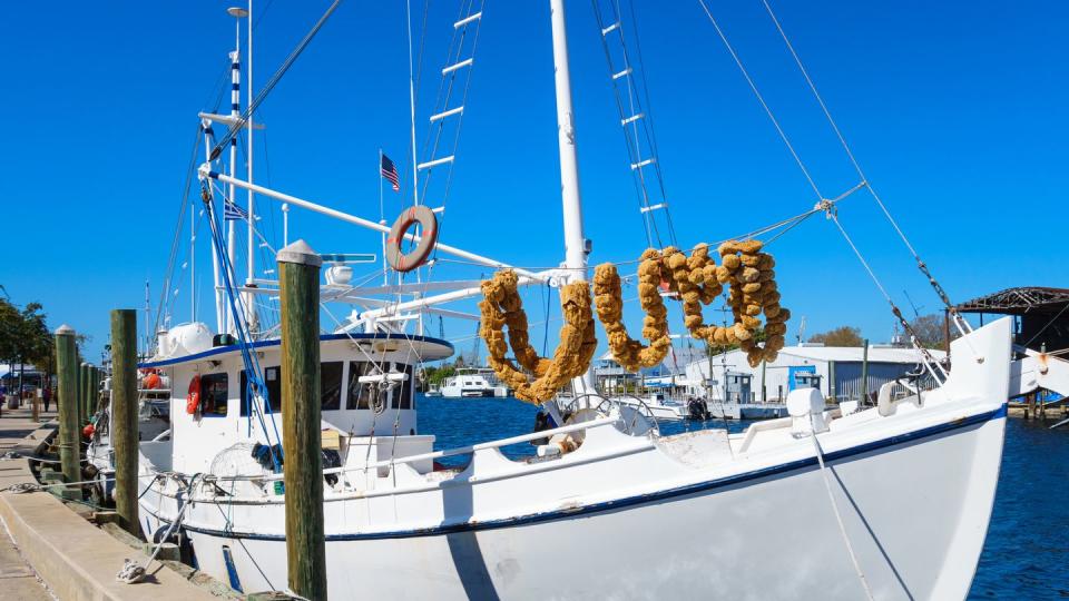 boat docked at sponge docks in tarpon springs florida