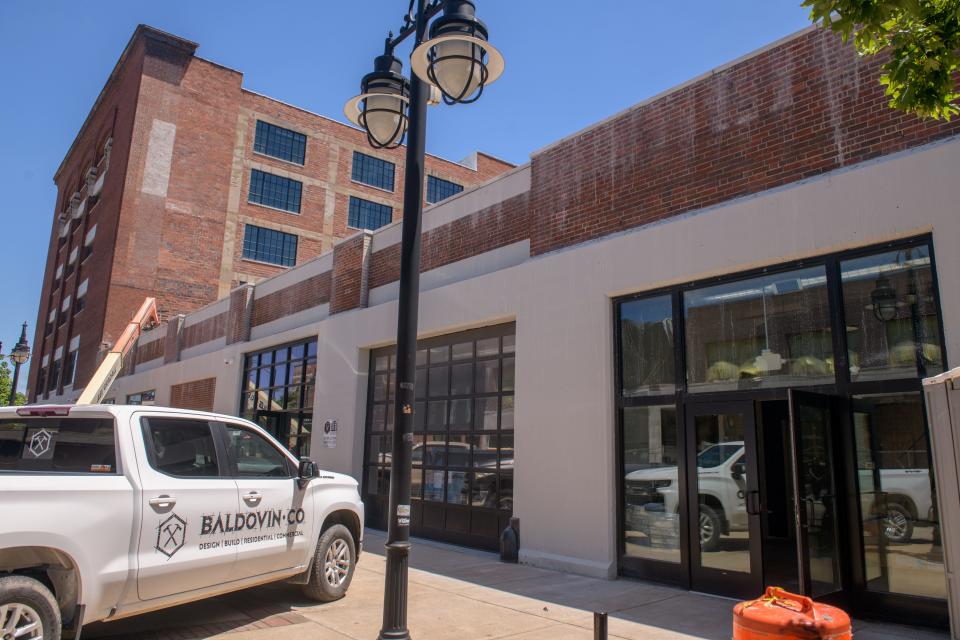 Work continues on the new Pop-Up Chicken Shop in the 800 block of SW Adams Street in Peoria's Warehouse District.