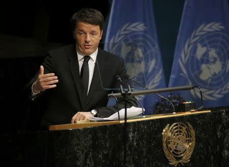 Italian Prime Minister Matteo Renzi delivers his remarks during the signing ceremony on climate change held at the United Nations Headquarters in Manhattan, New York, U.S., April 22, 2016. REUTERS/Carlo Allegri