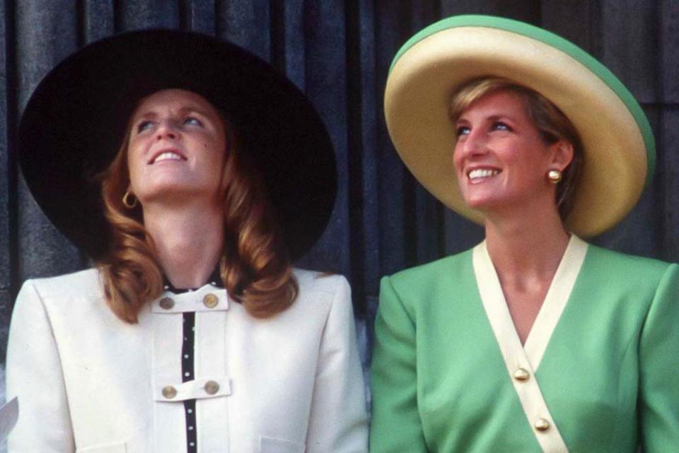 <p>Julian Parker/UK Press via Getty</p> Sarah Ferguson and Princess Diana attend the 50th Anniversary of The Battle of Britain Parade on the balcony of Buckingham Palace on September 15, 1990