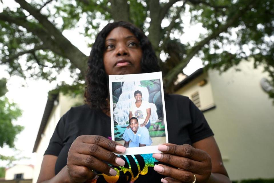 Shanitha Grissom holds a photo of her with her son De’Neair Stanley, made during a recent visit at his prison, Wednesday, June 12, 2024 in Winter Park, Fla. (Phelan M. Ebenhack for the Miami Herald)