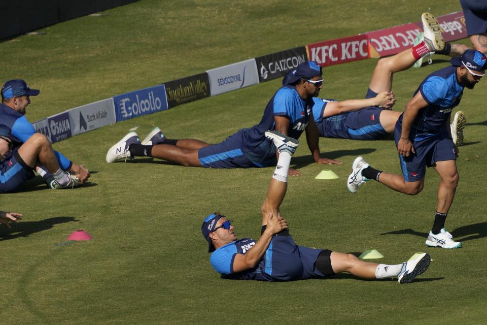 New Zealand's players warm up during a training session, in Karachi, Pakistan, Friday, Dec. 23, 2022. (AP Photo/Fareed Khan)