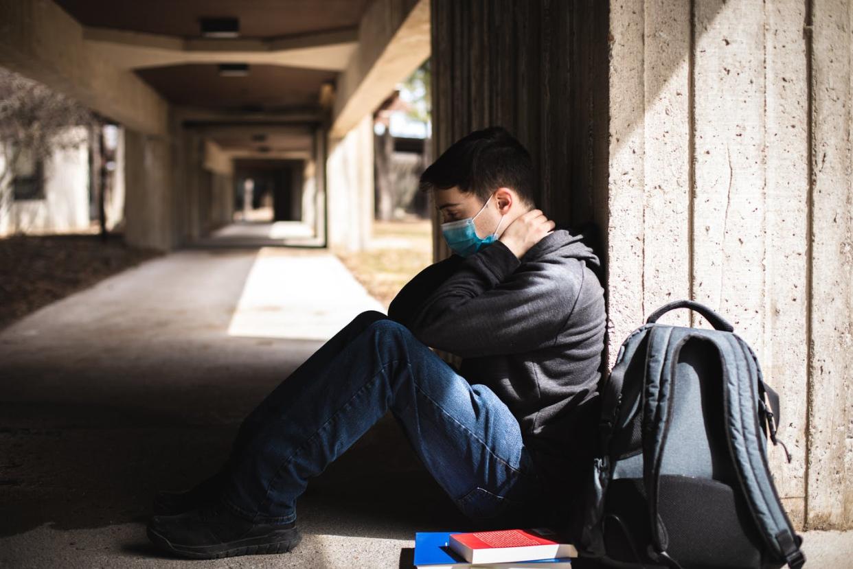 <span class="caption">Recent college graduates owed an average of nearly ,000 in student loans in 2019.</span> <span class="attribution"><a class="link " href="https://www.gettyimages.com/detail/photo/young-student-battling-with-mental-health-issues-royalty-free-image/1309350770?adppopup=true" rel="nofollow noopener" target="_blank" data-ylk="slk:lightspeedshutter/iStock via Getty Images Plus;elm:context_link;itc:0;sec:content-canvas">lightspeedshutter/iStock via Getty Images Plus</a></span>