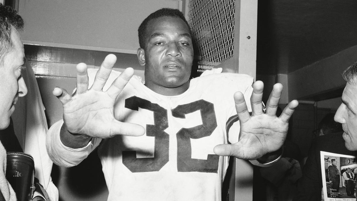 Mandatory Credit: Photo by Anonymous/AP/REX/Shutterstock (6634201a)Powerful Jimmy Brown of the Cleveland browns football team displays his sure hands in during room at New York's Yankee Stadium, after Cleveland beat the New York giants 35.