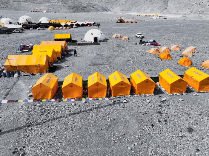 Tents on a rocky plain at the foot of Everest, Tibet