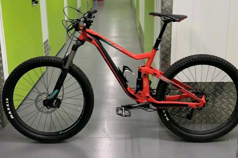 The stolen red Scott Genius 750 bike