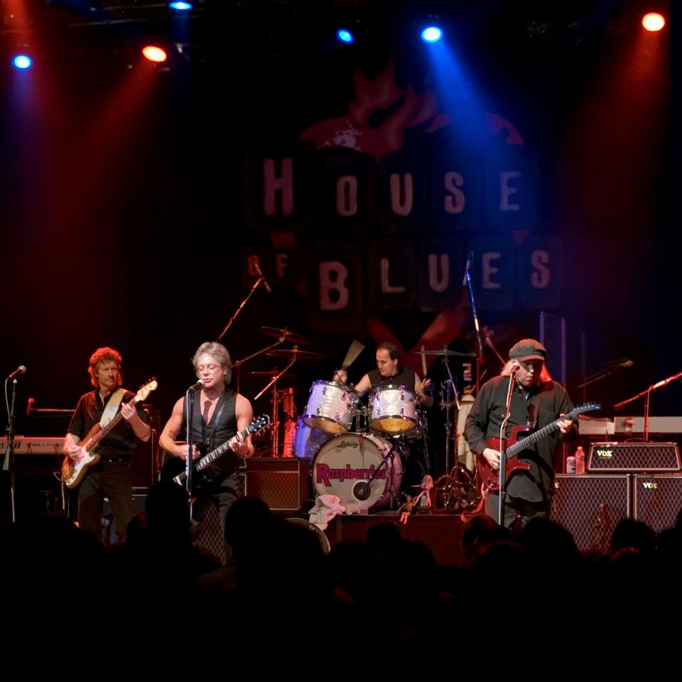 Dave Smalley, left, Eric Carmen, Jim Bonfanti on drums and Wally Bryson of the Raspberries perform at House of Blues Sunset Strip in 2005.