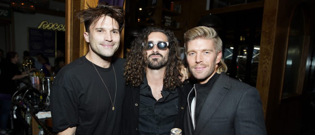 Tom Schwartz, Alex Propson, and Kyle Cook dressed in all black and smiling.