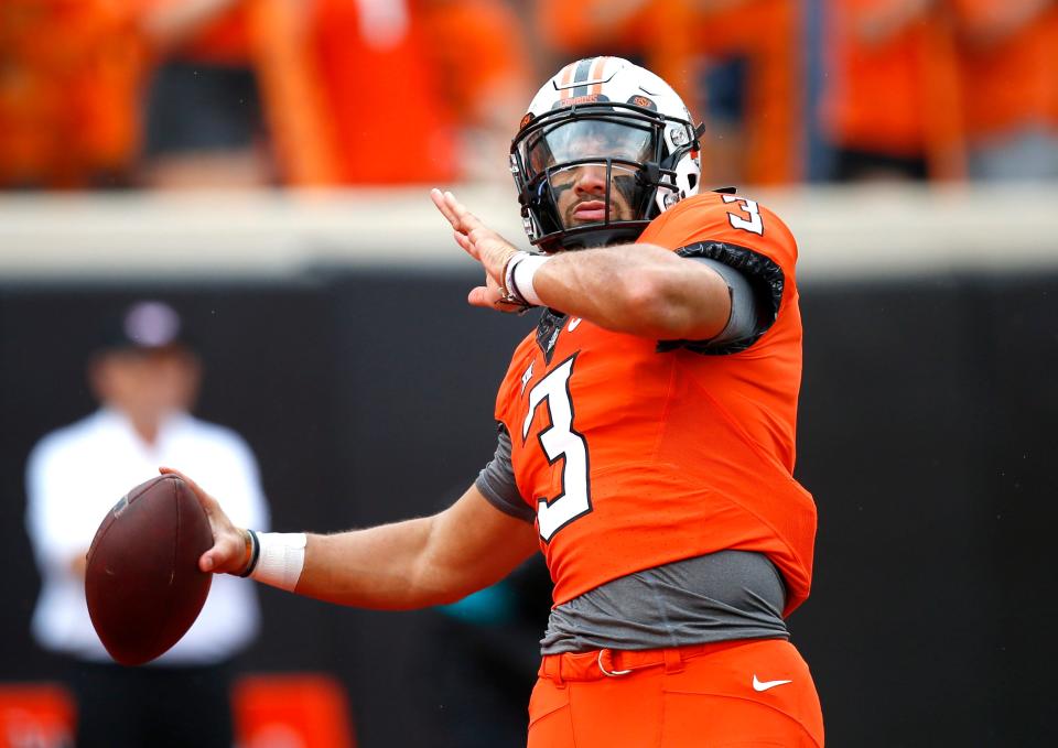 Sep 1, 2022; Stillwater, Oklahoma, USA;  Oklahoma State Cowboys' Spencer Sanders (3) throws a pass during a warm-up at Boone Pickens Stadium.