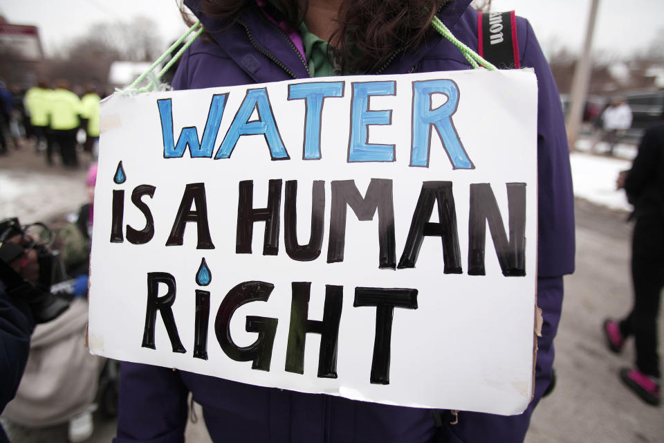 People gather in February 2016 for a mile-long march to highlight the push for clean water in Flint. (Photo: Bill Pugliano/Getty Images)