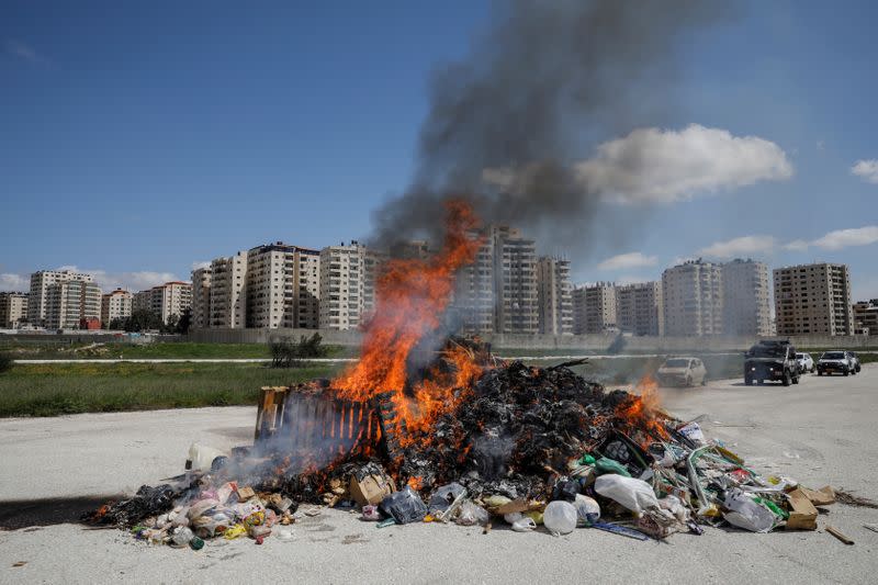 The Jerusalem municipality burns a pile of leavened bread collected from across the city, in lieu of it being burned by Jews in public, in a coronavirus disease (COVID-19) lockdown during the Jewish Passover holiday