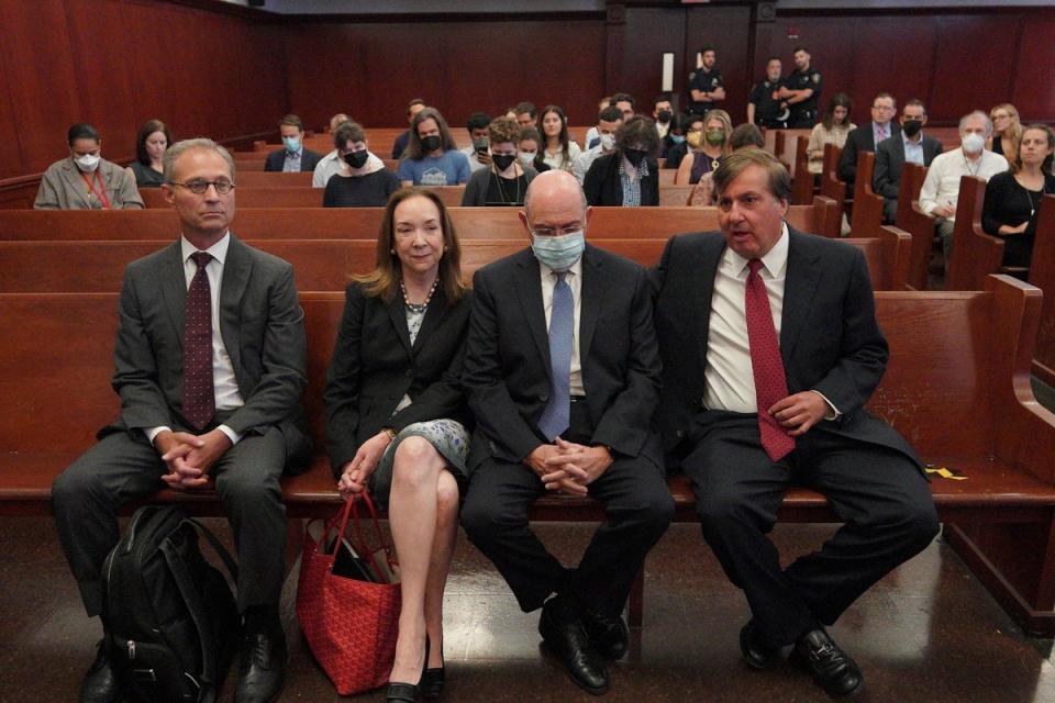 Weisselberg, second from right, sits in New York State Supreme Court (REUTERS)