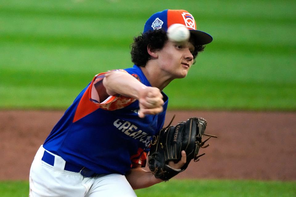 New Albany, Ohio's Kevin Klingerman delivers during the first inning of the team's baseball game against El Segundo, Calif., at the Little League World Series in South Williamsport, Pa., Thursday, Aug. 17, 2023.