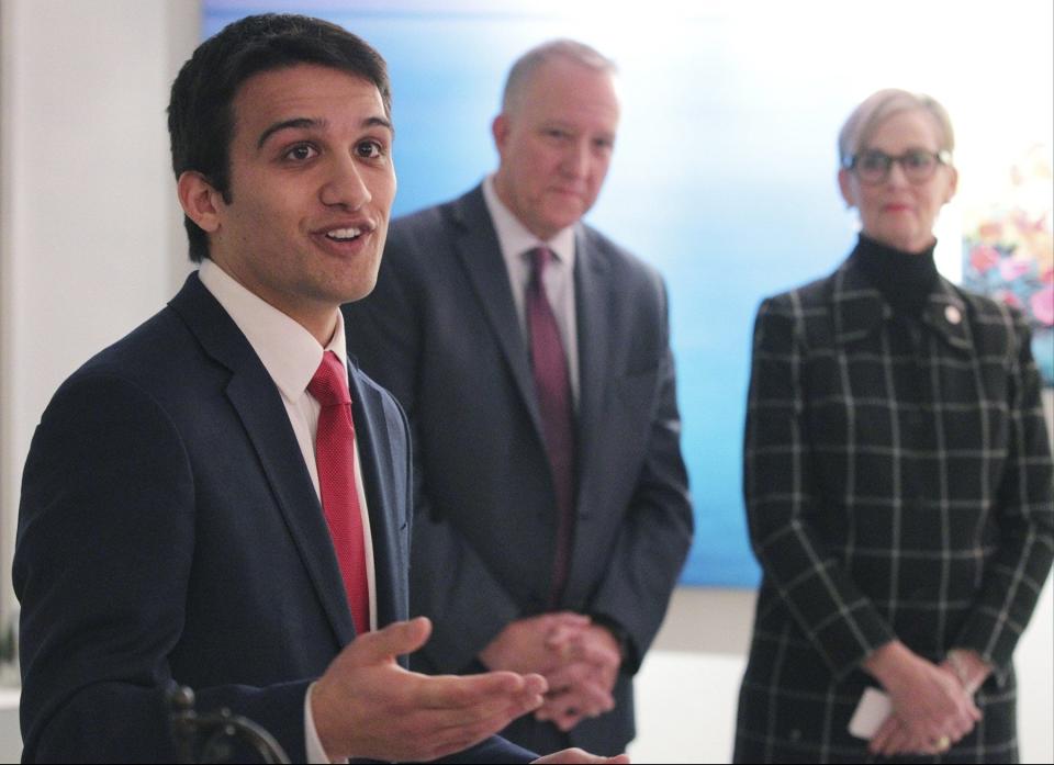 Shammas Malik announces in 2018 he's running for Akron City Council's Ward 8 as Akron Mayor Dan Horrigan and then-Ward 8 Councilwoman Marilyn Keith listen.