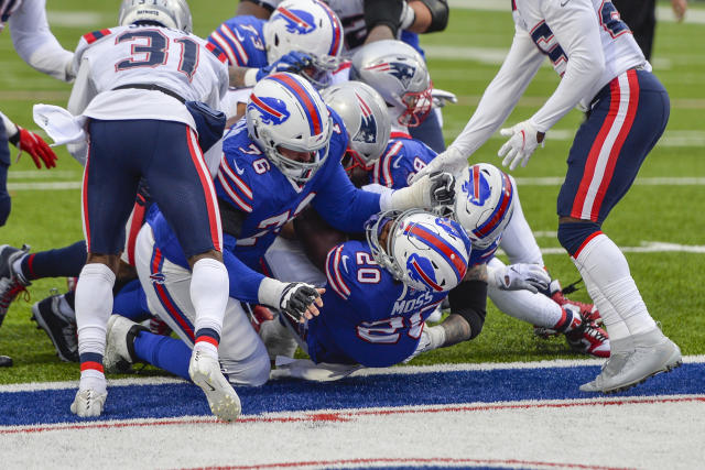 Buffalo Bills offensive guard Brian Winters and running back Devin