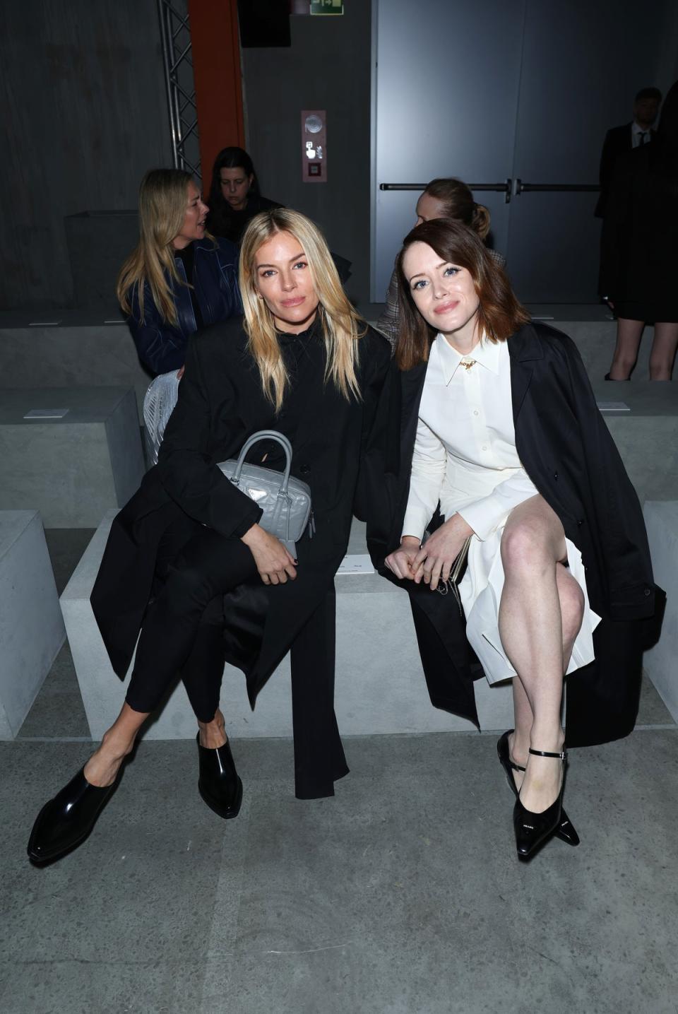 Sienna Miller and Claire Foy attend Prada Fall/Winter 2023 Womenswear Fashion Show (Getty Images for Prada)