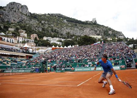 Rafael Nadal of Spain returns the ball to Teymuraz Gabashvili of Russia during the Monte Carlo Masters in Monaco April 16, 2014. REUTERS/Eric Gaillard