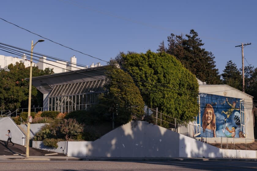 Pacific Palisades, CA - August 02: A mural dedicated to Molly Steinsapir, a 12-year-old girl who died in an e-bike crash, is seen on the exterior of the Pierson Playhouse on Tuesday, Aug. 2, 2022 in Pacific Palisades, CA. (Wesley Lapointe / Los Angeles Times)