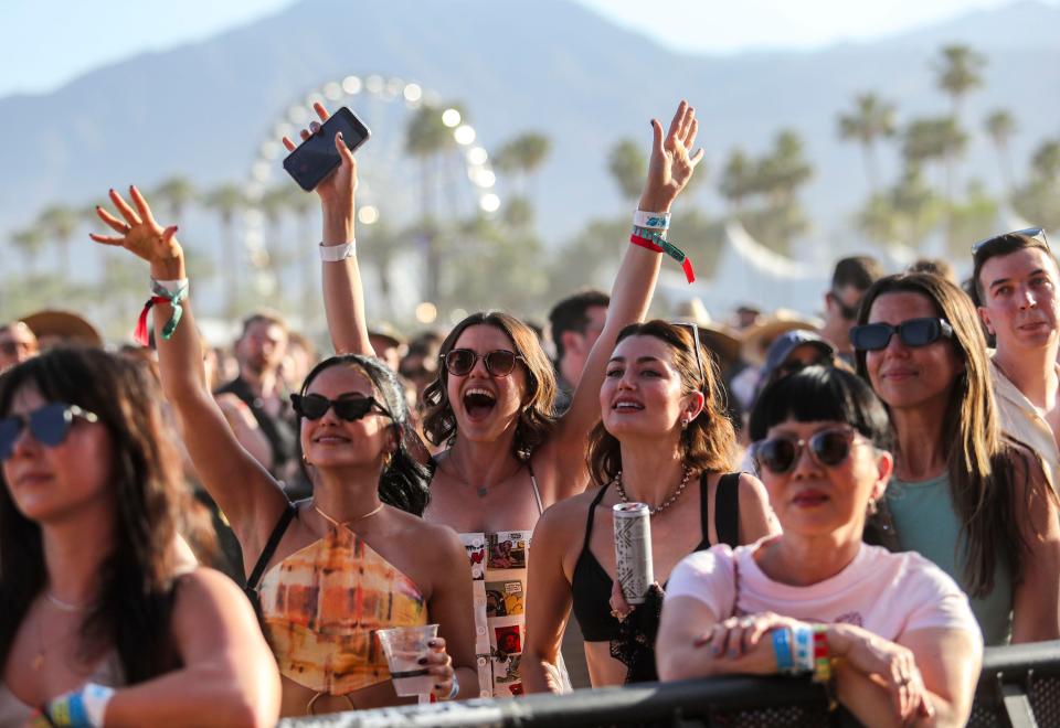 Fans cheer as Maggie Rogers performs on the main stage during the Coachella Valley Music and Arts Festival in Indio, Calif., Sunday, April 17, 2022.