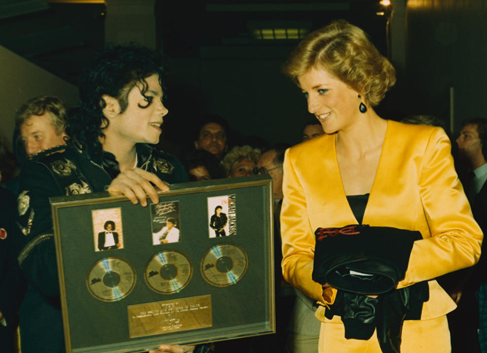 <p>Princess Diana was a huge music fan, and she was thrilled to meet the King of Pop when he performed at London’s Wembley Stadium on his <em>Bad</em> tour in 1988. Afterwards, they began talking over the phone, mostly late at night for him, and bonded over their disdain for the tabloids. “We could relate to each other,” he said in the 2003 TV doc <i>Michael Jackson’s Private Home Movies</i>. “We shared something in common with the press. I don’t think they hounded any one more than her and myself.” He added that they would “cry on each other’s shoulders.” (Photo: Lynn Goldsmith/Corbis/VCG via Getty Images) </p>