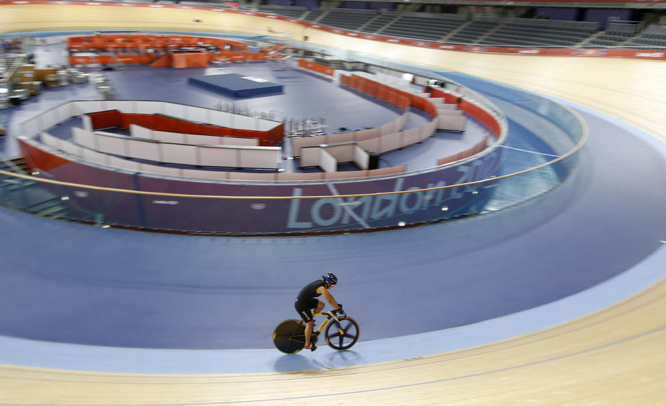 A Chinese cyclist trains at the Velodrome at the Olympic Park, Saturday, July 21, 2012, in London. Opening ceremonies for the 2012 London Olympics will be held Friday, July 27. (AP Photo/Jae C. Hong)