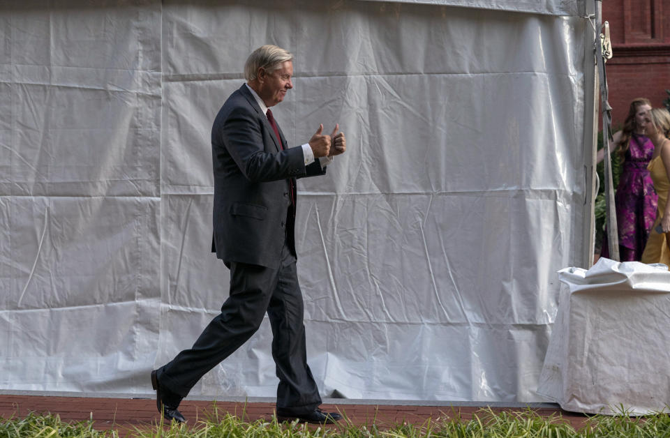 Sen. Lindsey Graham, R-S.C., arrives to attend an event sponsored by Susan B. Anthony Pro Life America at the National Building Museum, Tuesday, Sept. 13, 2022 in Washington. (AP Photo/Gemunu Amarasinghe)