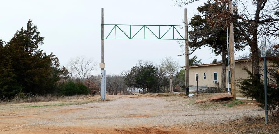 Property at the intersection of R Road and Cedar Oaks Terrace in Logan County is pictured March 8. Authorities said bone fragments have been found in a compound here. Jason Dean Cornett has been accused of killing a man and then disposing the remains at the property.