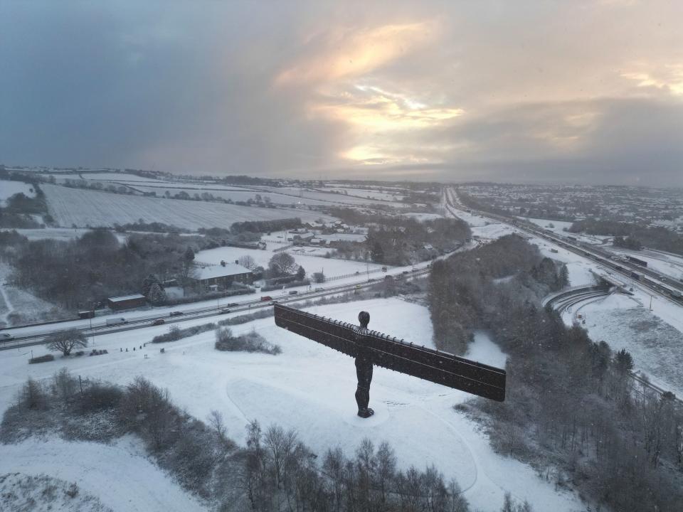 The Angel of the North statue in Gateshead covered in snow (PA)
